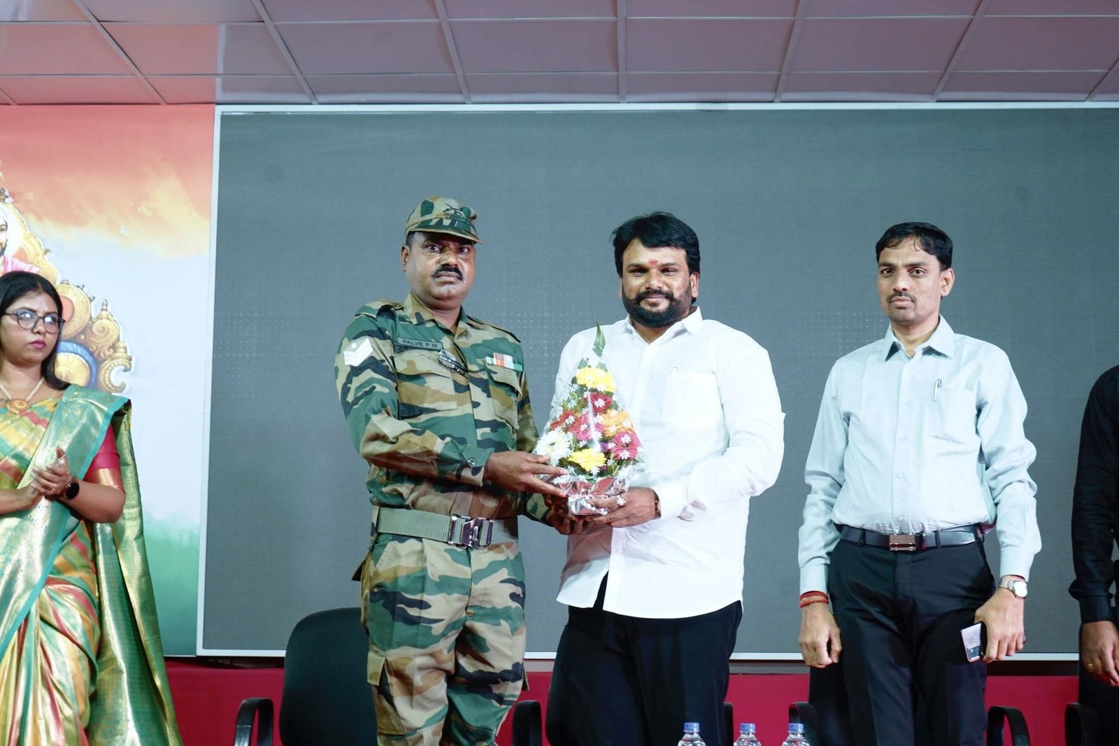Army Officer Felicitating Director at Kota Rankers Point Pune